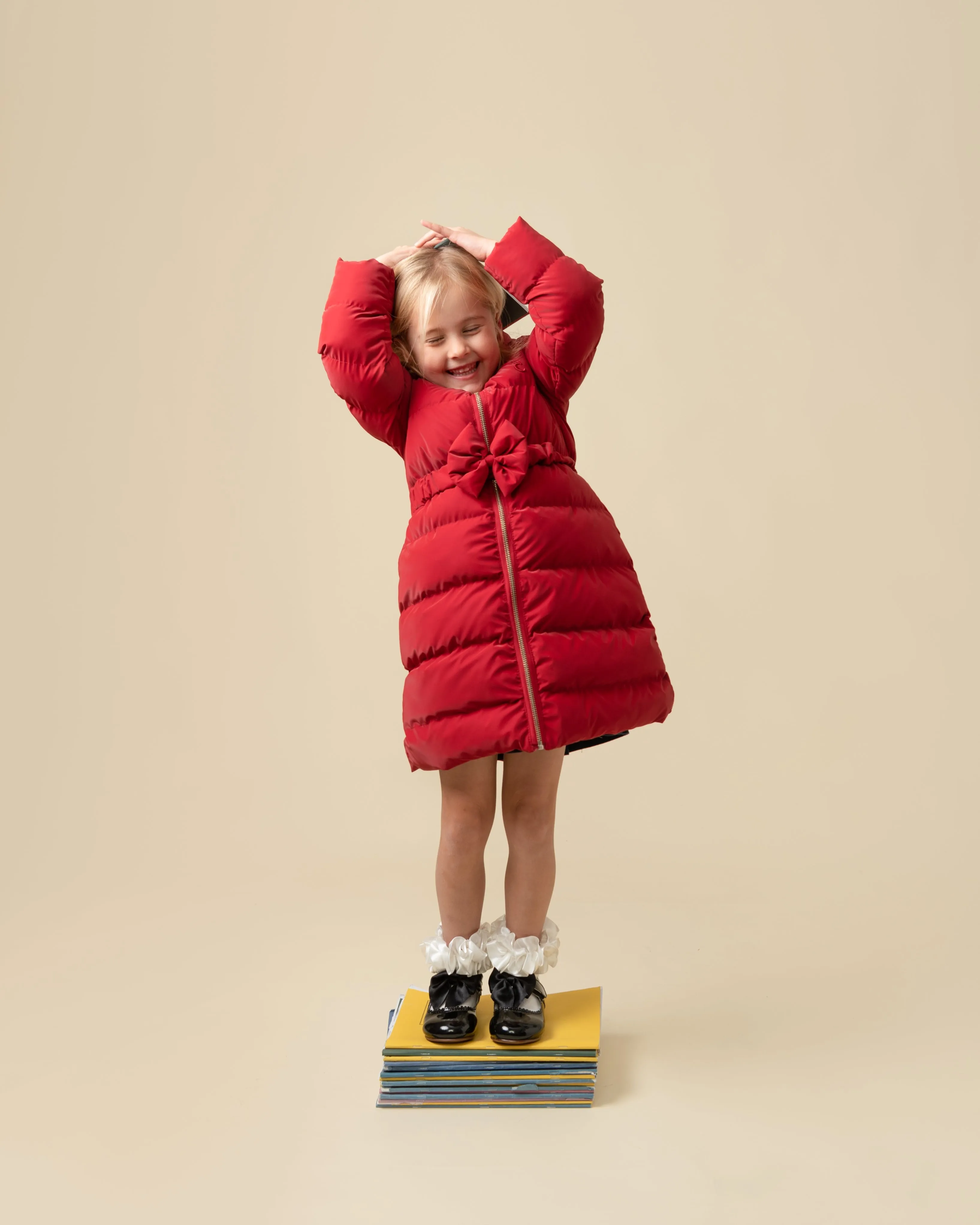 Caramelo Kids Girls Red Matt Puffer Jacket with Belt and Bow trim